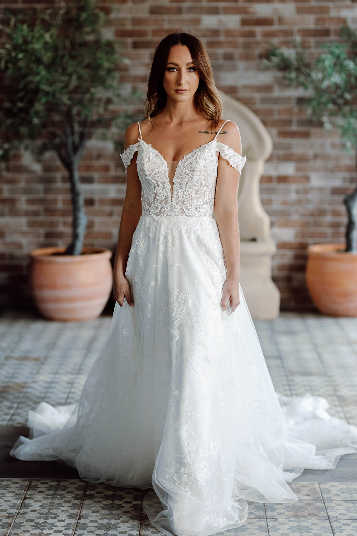 Abigail from the RSVP Bridal Collection features a lace bodice with a-line tulle skirt