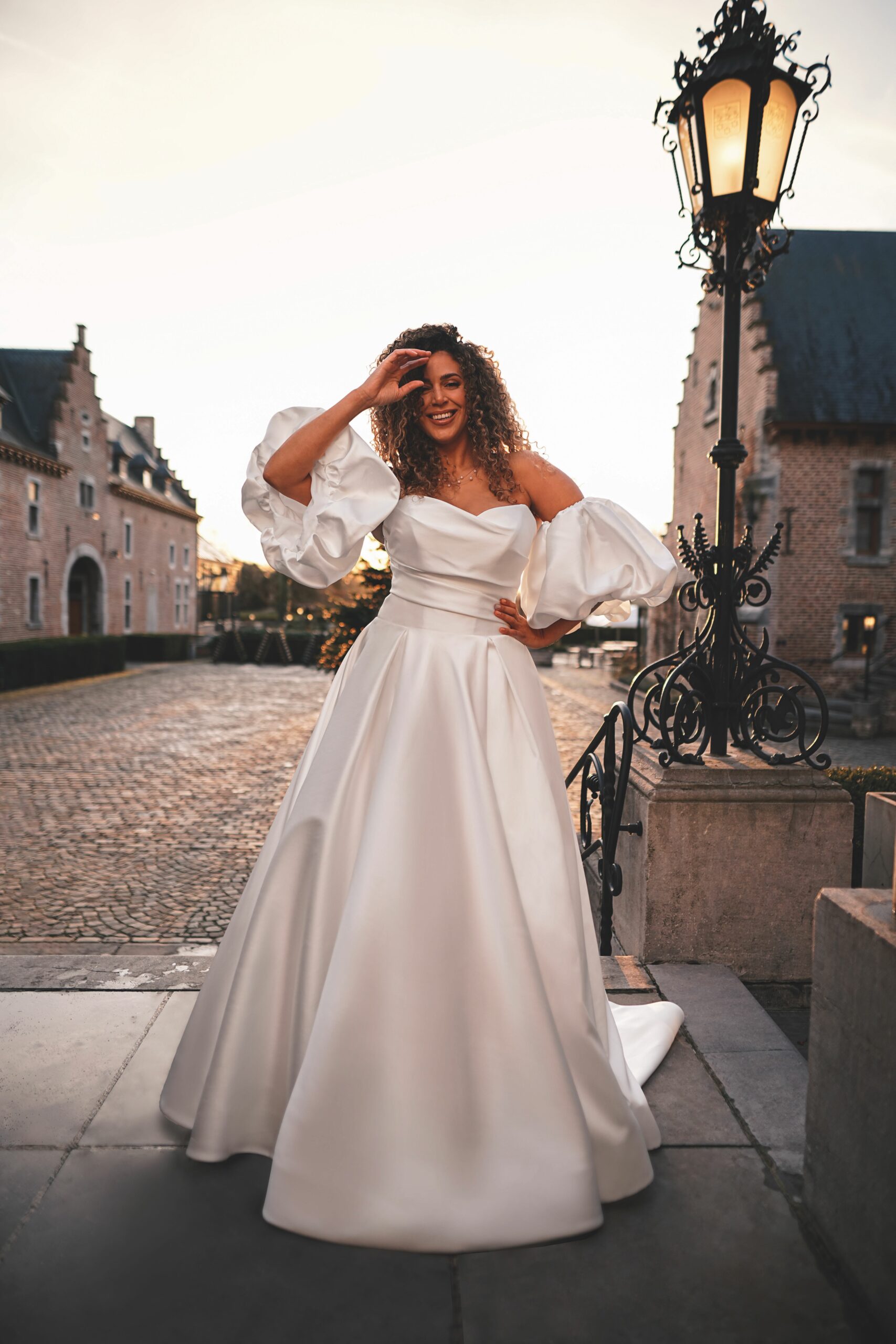 Embrace the timeless elegance of the Ilse dress, exquisitely crafted from luxurious mikado fabric. The A-line silhouette flows gracefully, creating a flattering and sophisticated look for any bride. The sweetheart neckline adds a touch of romance and femininity to the ensemble.