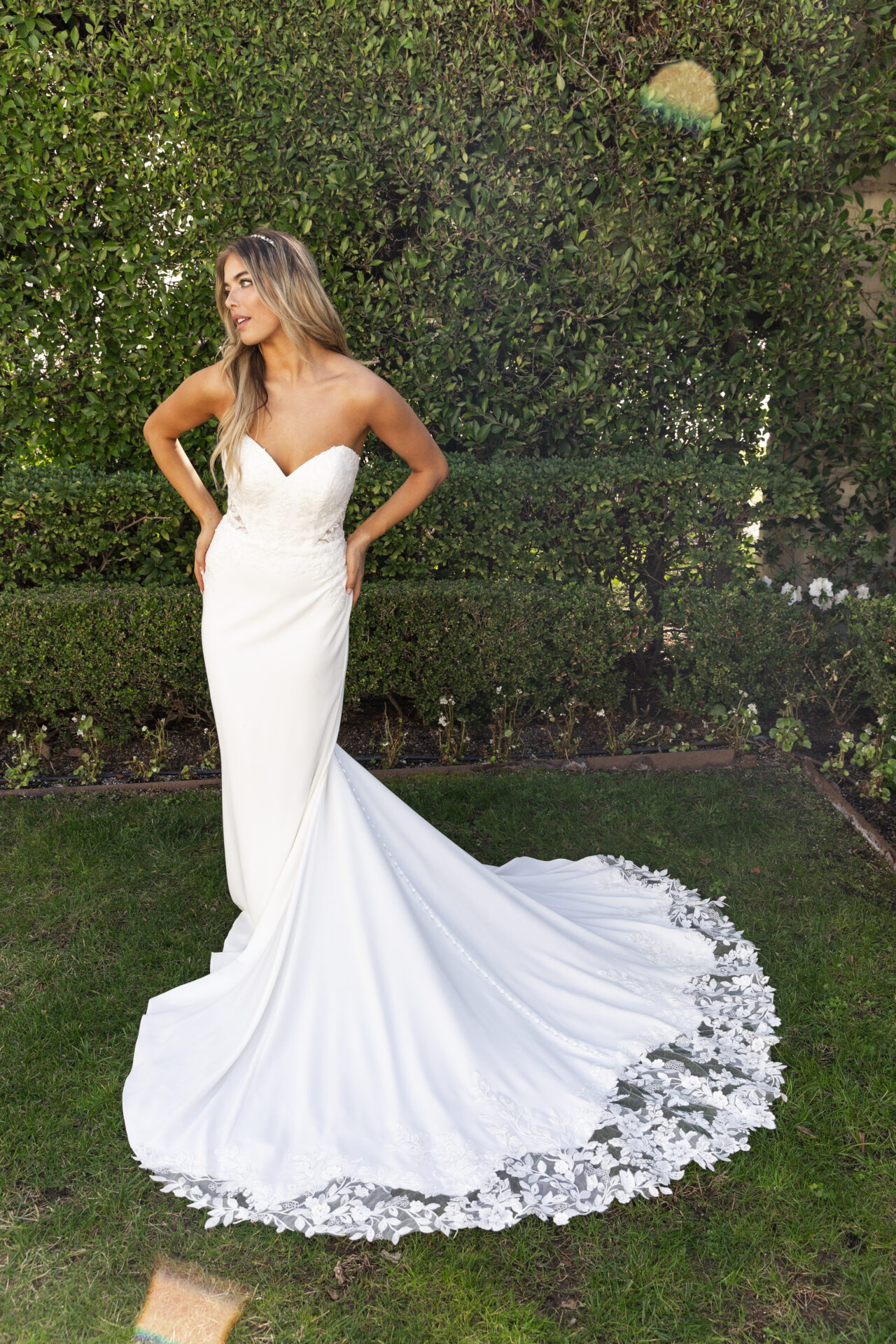 Stella York 7634 strapless wedding dress with lace applique, lace cutout on train in ivory