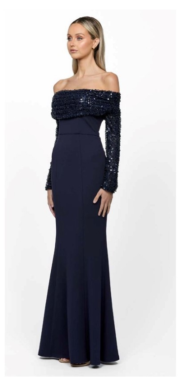 Kiara B63D24 by Bariano. Long sleeve off the shoulder formal dress with sequin cuff & sleeves. Sleeves are detachable. Navy side