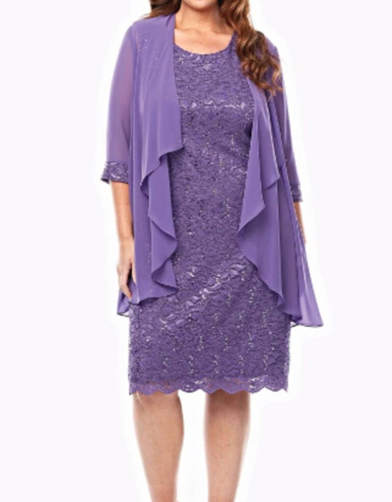 Model wearing Layla Jones LJ0181 mid-length stretch sequin lace dress with scalloped hem and matching 3/4 sleeve chiffon waterfall jacket in Lilac.