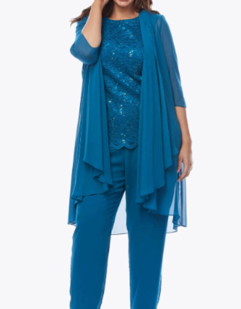 Model wearing the Layla Jones LJ0402 teal 3 piece pant suit featuring a stretch sequin sleeveless top, flowing chiffon pants and matching chiffon waterfall jacket.