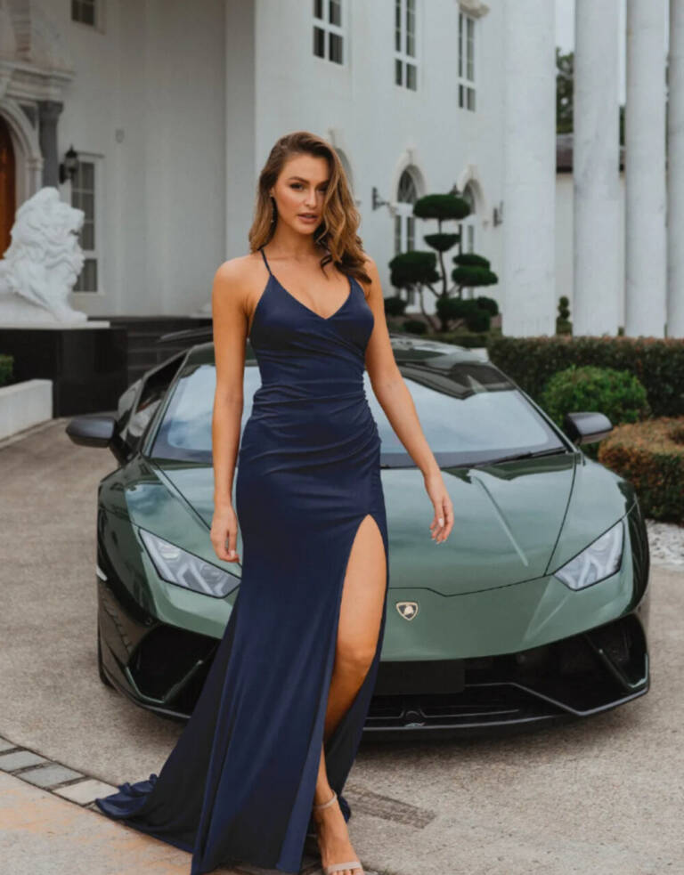 Milton PO917 Formal Dress by Tania Olsen Designs features a scoop neckline, laceup back, ruched derriere, small train in a jersey fabric. shown in navy