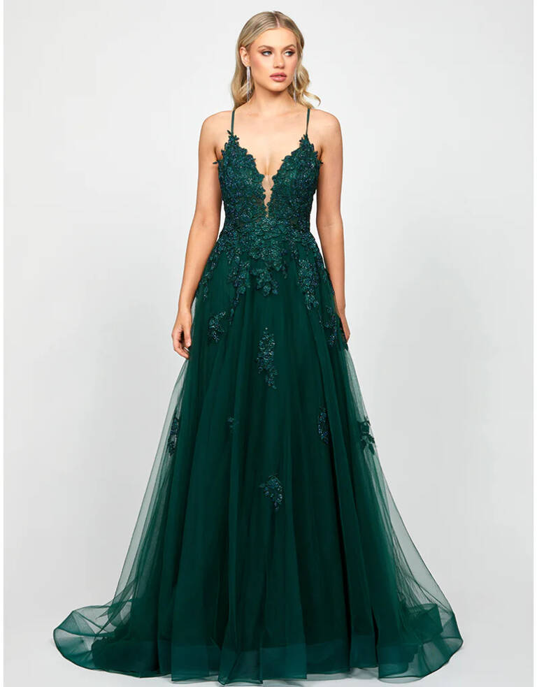 Alie Plunging Ball Gown B73D84L – sheer plunging V-neckline with lace appliqué bodice, open back tie detail, flowing tulle ball gown skirt with high split