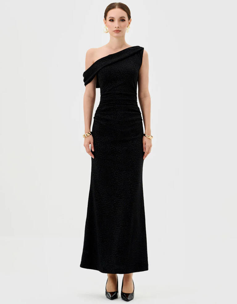 Thaliah Drape Off-Shoulder Maxi — Black (BL81D35L) one-shoulder ruched maxi dress with fitted silhouette and subtle flared hem, front view on model