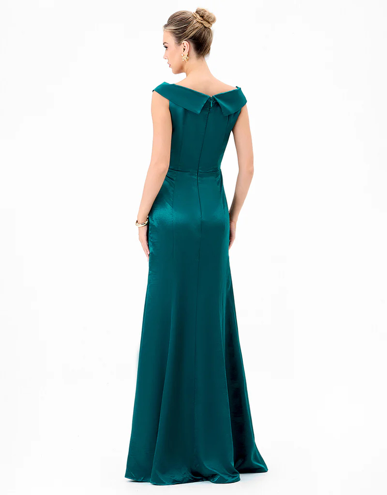 Back view of teal off-shoulder gown showing V back collar detail, smooth fitted waist and full-length skirt with invisible zip.