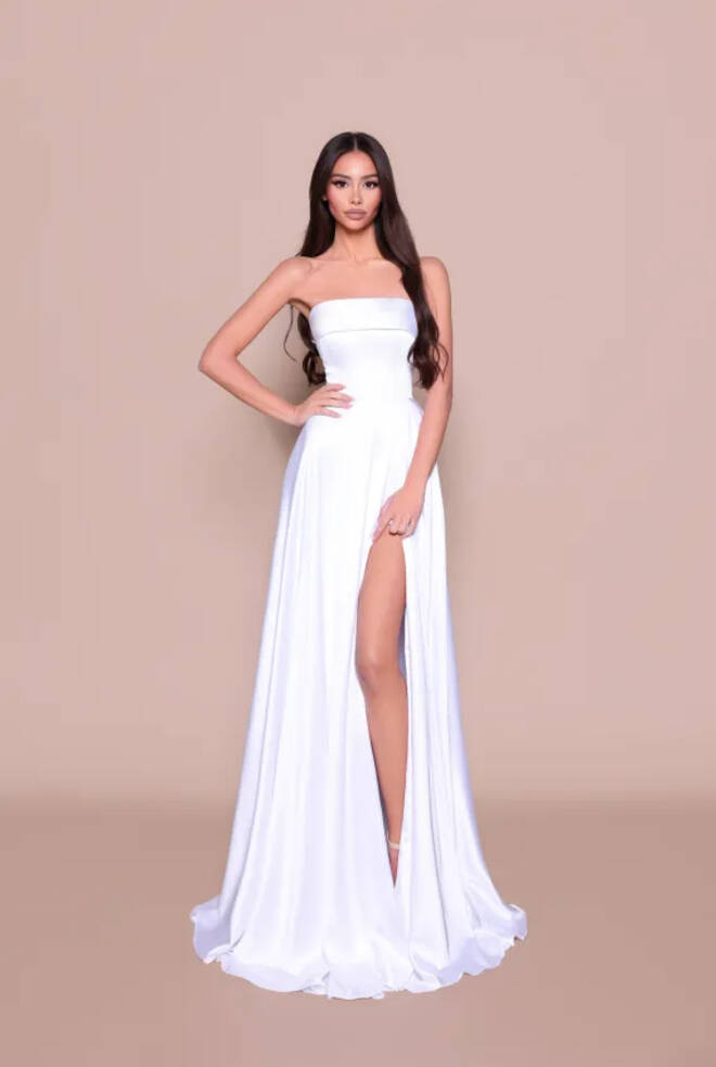 Front view of the Nicoletta NBM3034 Debutante Dress in white satin with a strapless neckline, high split and floor-length skirt.