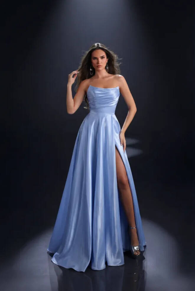 Nicoletta NC4058 formal dress in powder blue liquid satin with a strapless draped neckline, flowing full-length skirt and high thigh split.