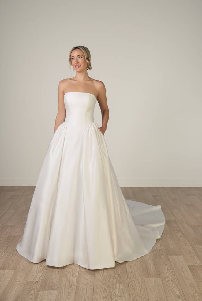 Front view of Style SY8274 strapless Mikado wedding dress with a straight neckline, structured bodice, full A-line skirt, and hidden pockets.