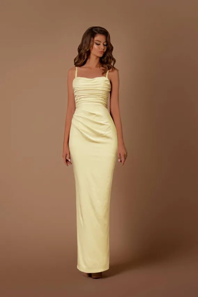 Nicoletta NBM1024 soft lemon full-length formal dress with spaghetti straps, gathered cowl neckline, ruched bodice and fitted column skirt.