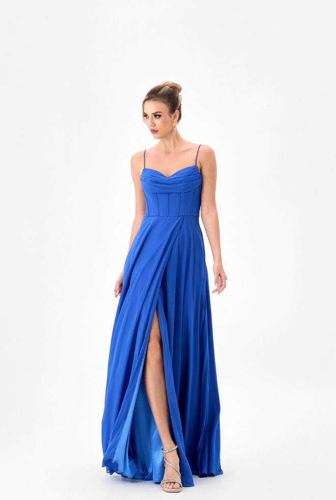 Olive B85D0405 by Bariano Australia royal blue formal gown with cowl neckline, spaghetti straps, corset bodice, flowing wrap skirt and high leg split.