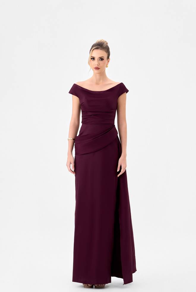Wallace B85D0401 by Bariano in burgundy taffeta formal gown with off-the-shoulder neckline, pleated waist sash and full-length column skirt.