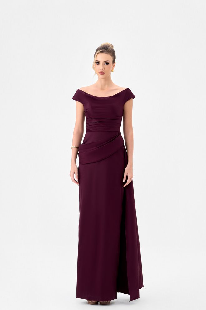 Wallace B85D0401 by Bariano in burgundy taffeta formal gown with off-the-shoulder neckline, pleated waist sash and full-length column skirt.