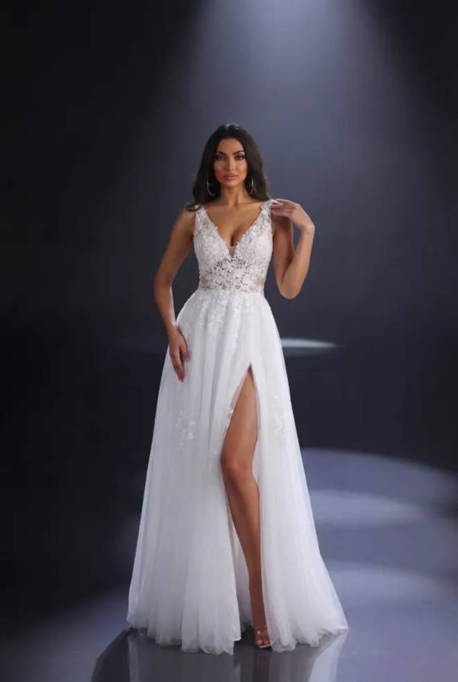 Nicoletta NC4023 ivory embroidered tulle wedding dress with plunging V-neckline, floral lace bodice and thigh-high split.