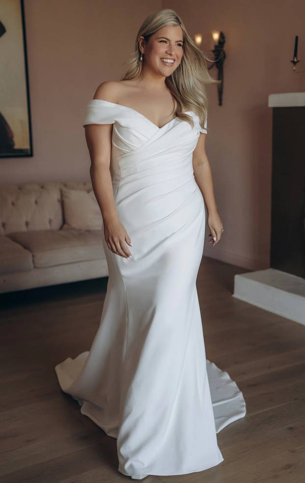 Stella York SY8330+ off-the-shoulder fit-and-flare wedding gown in stretch crepe with ruched bodice, front view.
