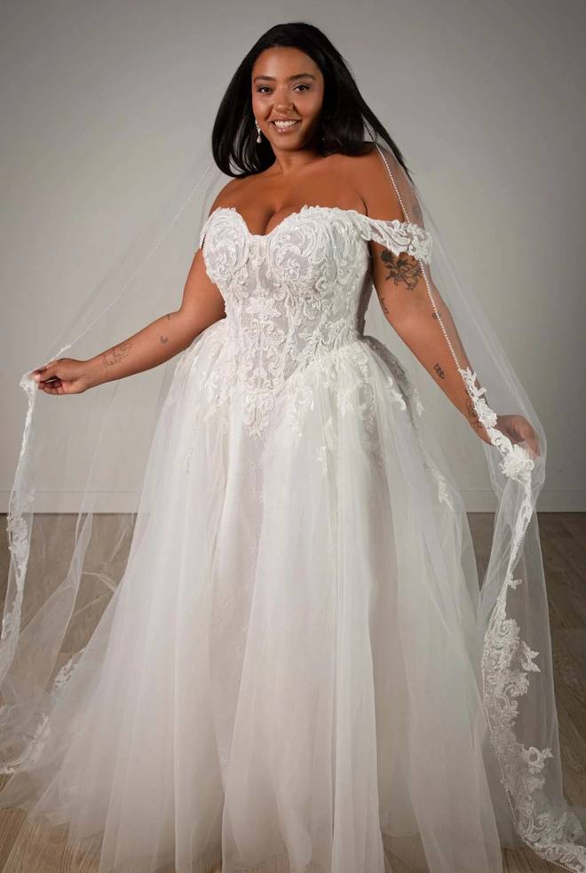 Stella York SY8345 ivory lace and tulle A-line wedding dress with sweetheart neckline and detachable off-the-shoulder floral straps.